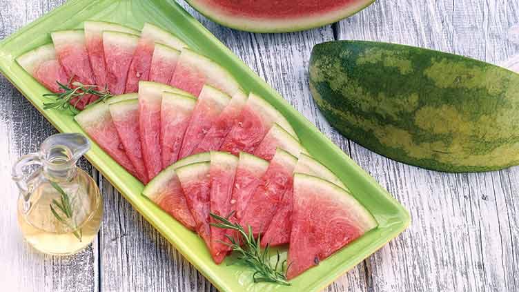 Sliced Melon with Honey Rosemary Syrup